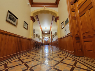 Colour photograph of a hallway in the Courthouse showing the tile floor